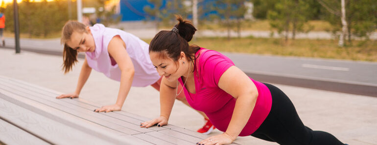 two women working out outside